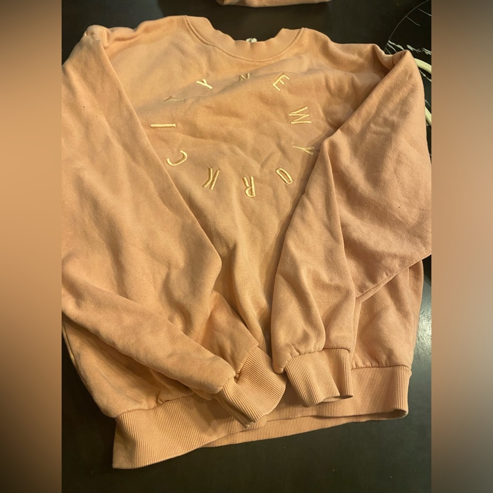 Gently worn pink sweater size 12